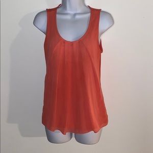 Polyester tank with rayon shell